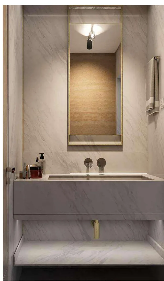Vanity elevation: a wall-mounted grey unit with an inset trough basin, brass-framed mirror and concealed under-shelf lighting.