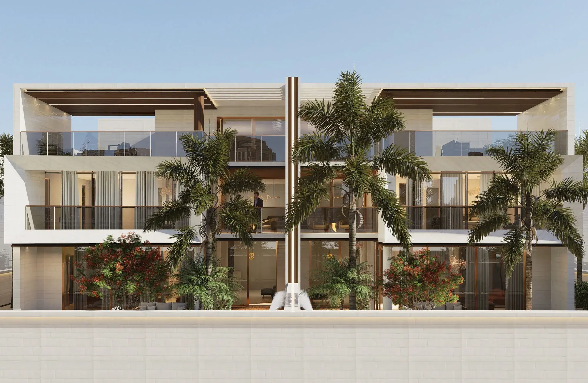 Garden elevation by day: two mirrored units behind a low white boundary wall, deep timber pergolas over the upper terraces, mature palms and flowering trees, and a slim water feature on the centre line.